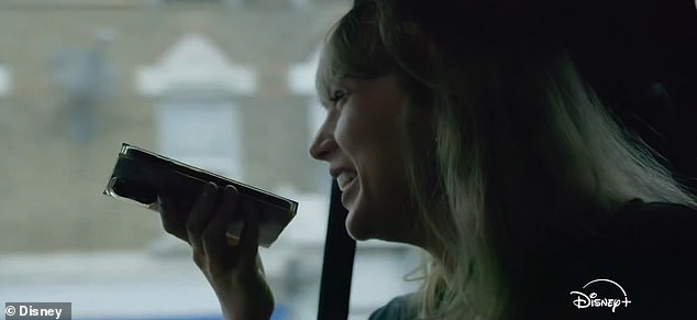 Taylor Swift smiles in the backseat while on the phone with Travis Kelce, saying "We basically have the same job" in the trailer.
