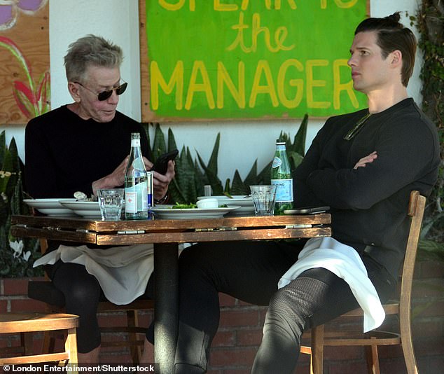 Calvin Klein and Kevin Baker dining in West Hollywood in 2021.