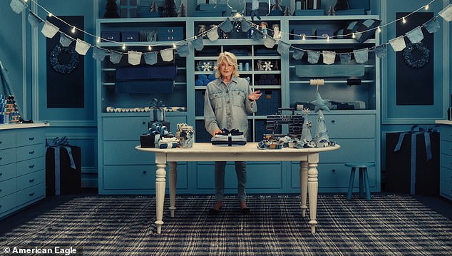 Martha Stewart in a promotional video wrapping an American Eagle box in denim while wearing light-wash denim