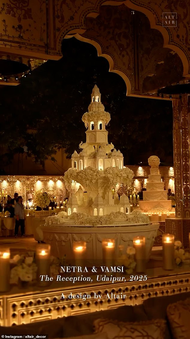 The towering palace-inspired wedding cake with sculpted animals and flowers
