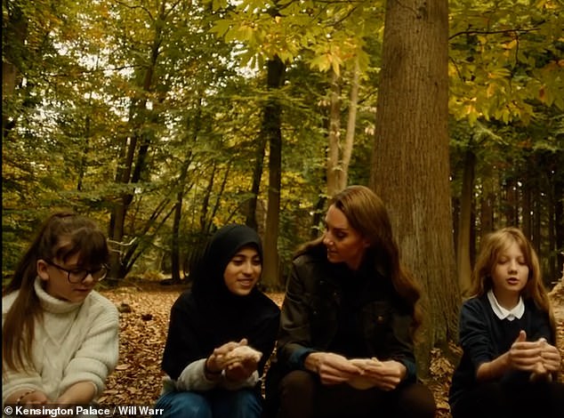 The Princess of Wales walks through the forest, admiring the changing autumn leaves.