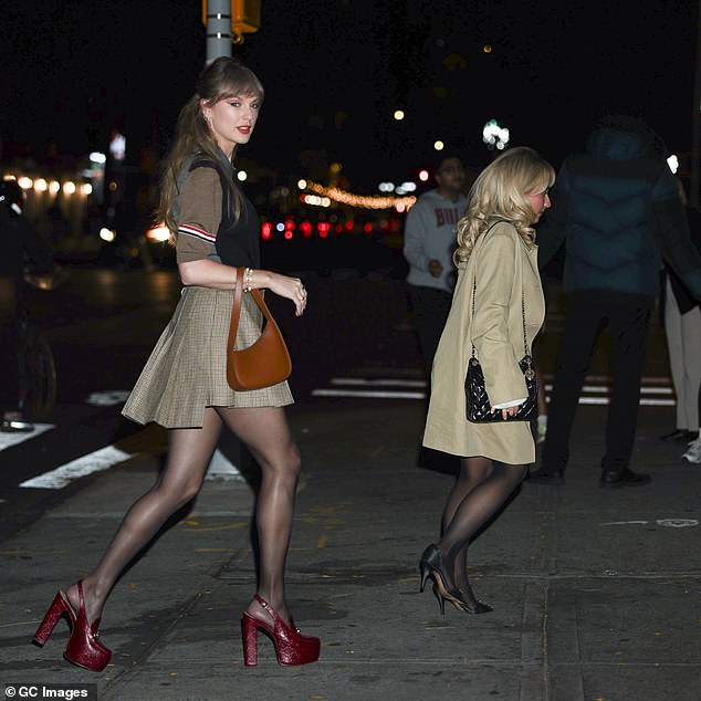 Taylor Swift dining in New York with Sabrina Carpenter, a sighting that fueled bridal-party speculation.