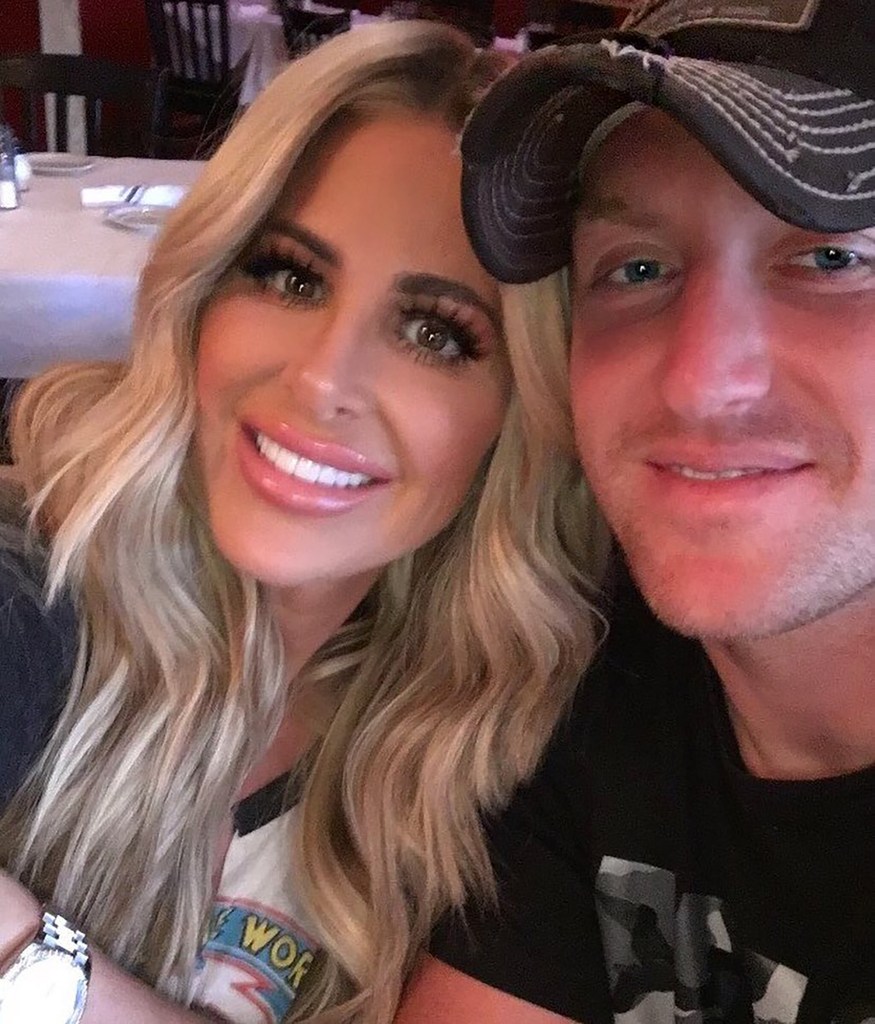 Kim Zolciak and Kroy Biermann smiling in a selfie.