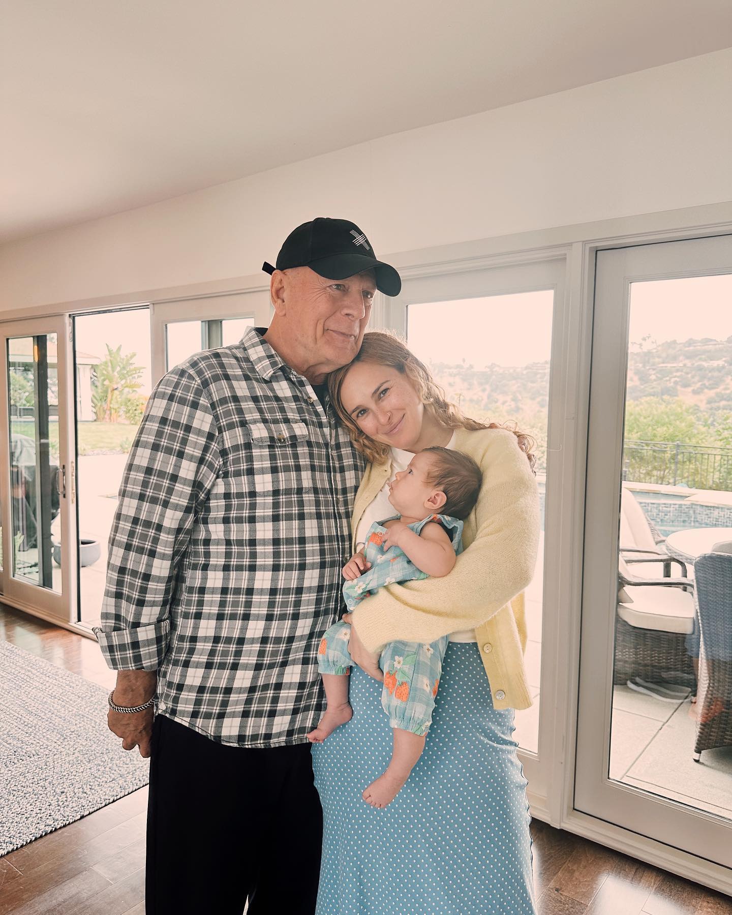 Bruce Willis with Rumer Willis, who is holding her daughter, Louetta.