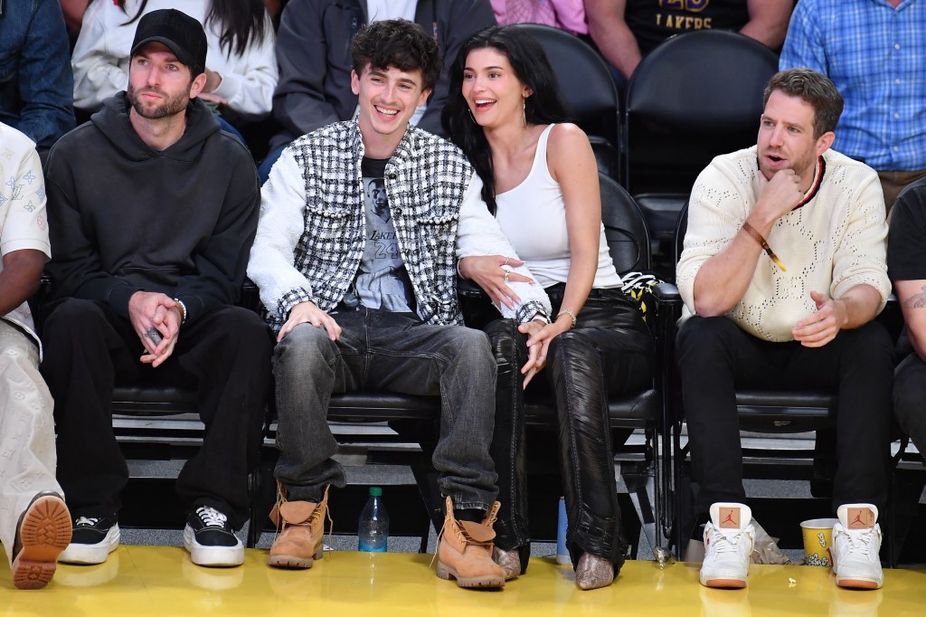 Timothee Chalamet and Kylie Jenner attend a Los Angeles Lakers basketball game.