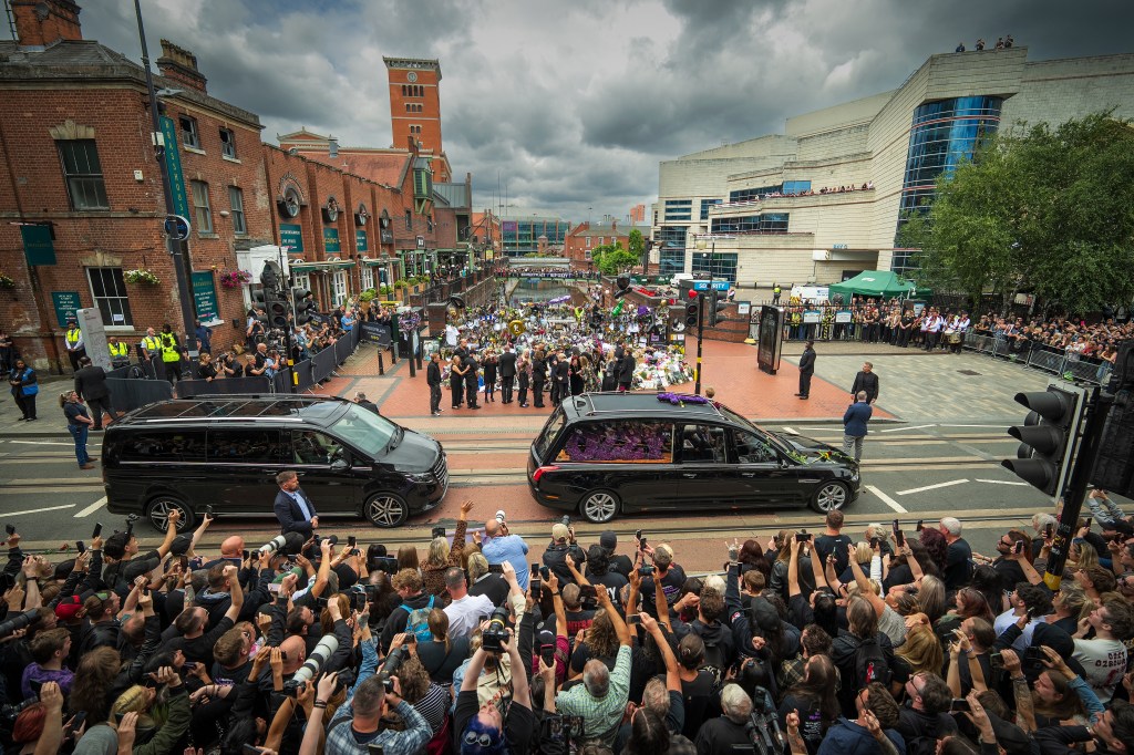 Funeral cortege of Ozzy Osbourne travels through Birmingham, England, lined by crowds of fans and tributes at the Black Sabbath Bench and Bridge.