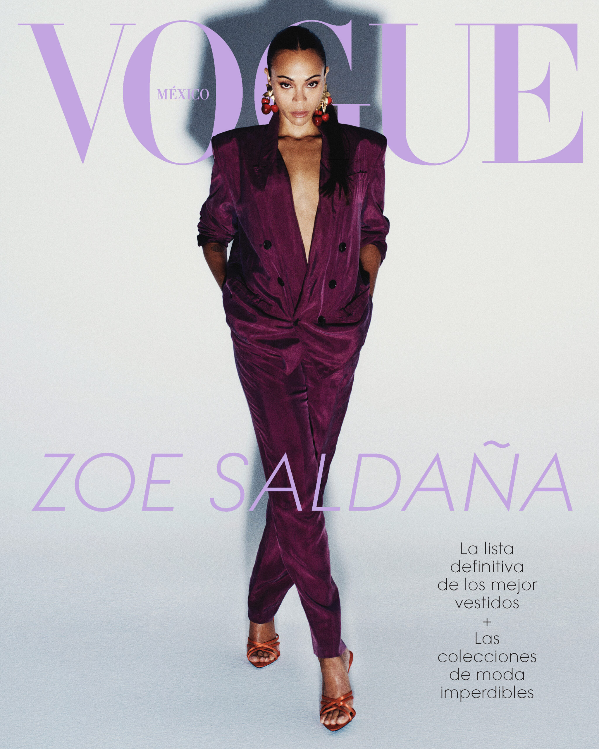 Zoe Saldana in a purple pantsuit and red heels on the cover of Vogue Mexico.