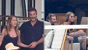 Jennifer Aniston and Jim Curtis pictured together in New York in 2025.