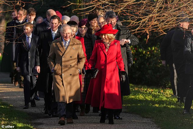 King Charles leads the royal family past smiling well-wishers during the Christmas Day walk