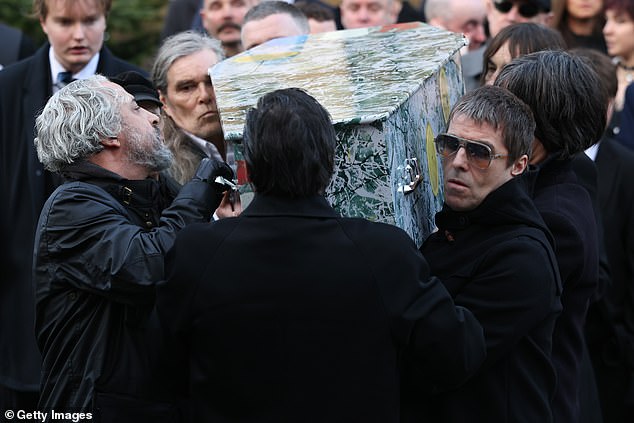 Ian Brown and Primal Scream's Bobby Gillespie alongside Mani's coffin at Manchester Cathedral