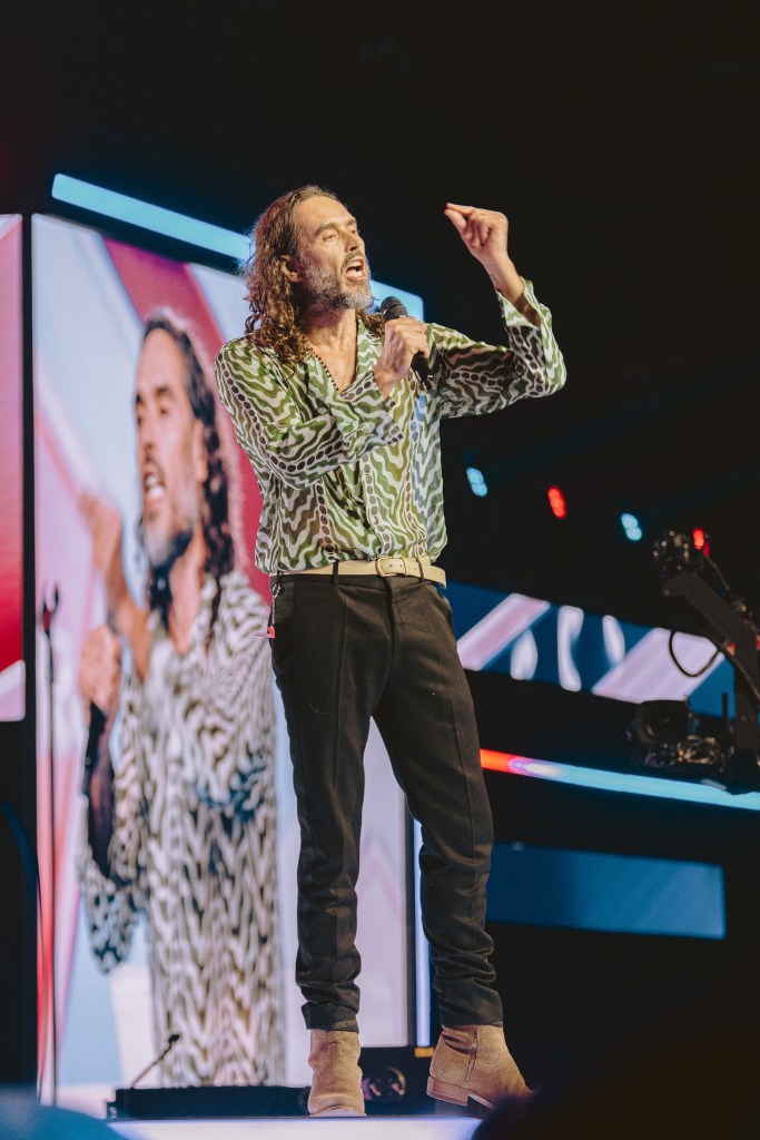Russell Brand speaks at AmericaFest 2025 in Phoenix, where he called Justin Trudeau a 'globalist stooge.'