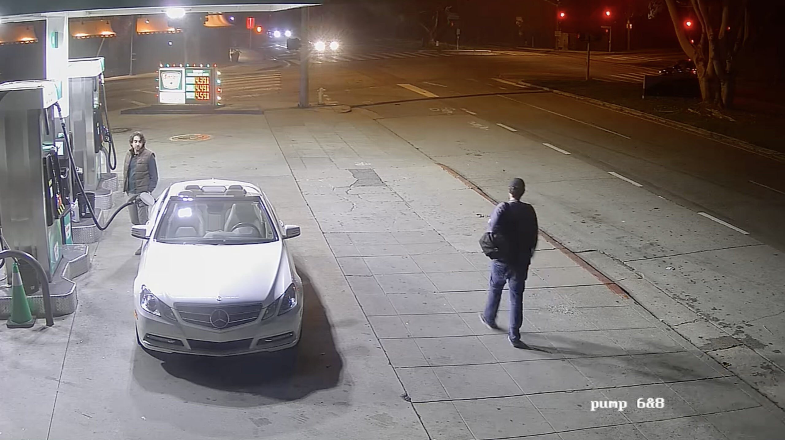 Surveillance still reportedly showing Nick Reiner walking past a Brentwood gas station shortly before midnight on Saturday.