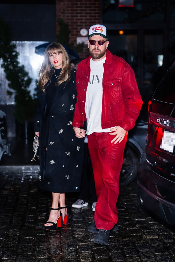 Taylor Swift and Travis Kelce walk hand-in-hand in New York City.