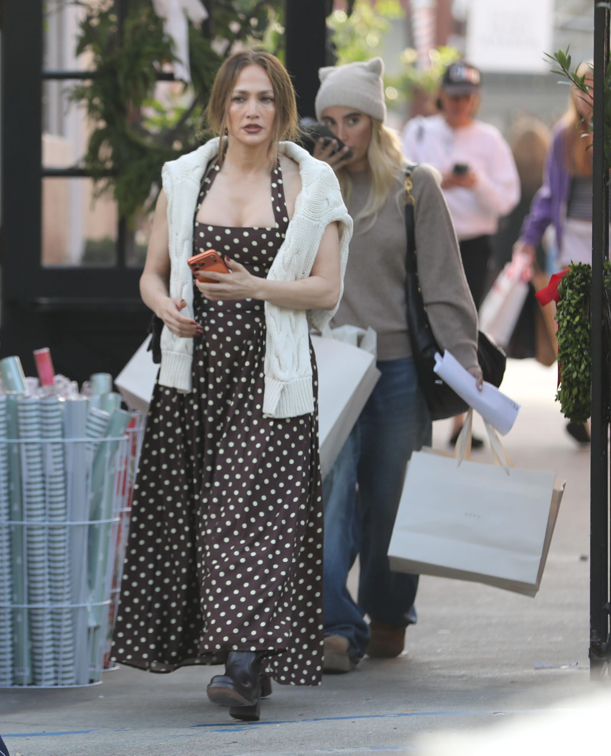Jennifer Lopez shops with Ben Affleck's son Samuel at Brentwood Country Mart during a pre-Christmas outing.