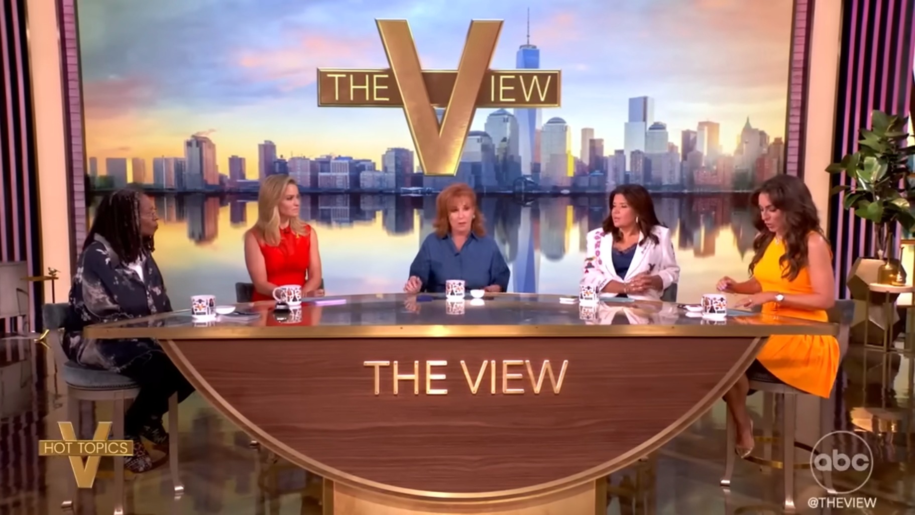 The View hosts at the table during the talk show.