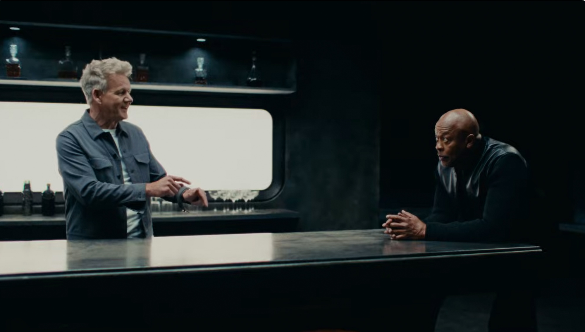 Gordon Ramsay and Dr. Dre share a laugh on the HexClad 'Gin and Juice' ad set.