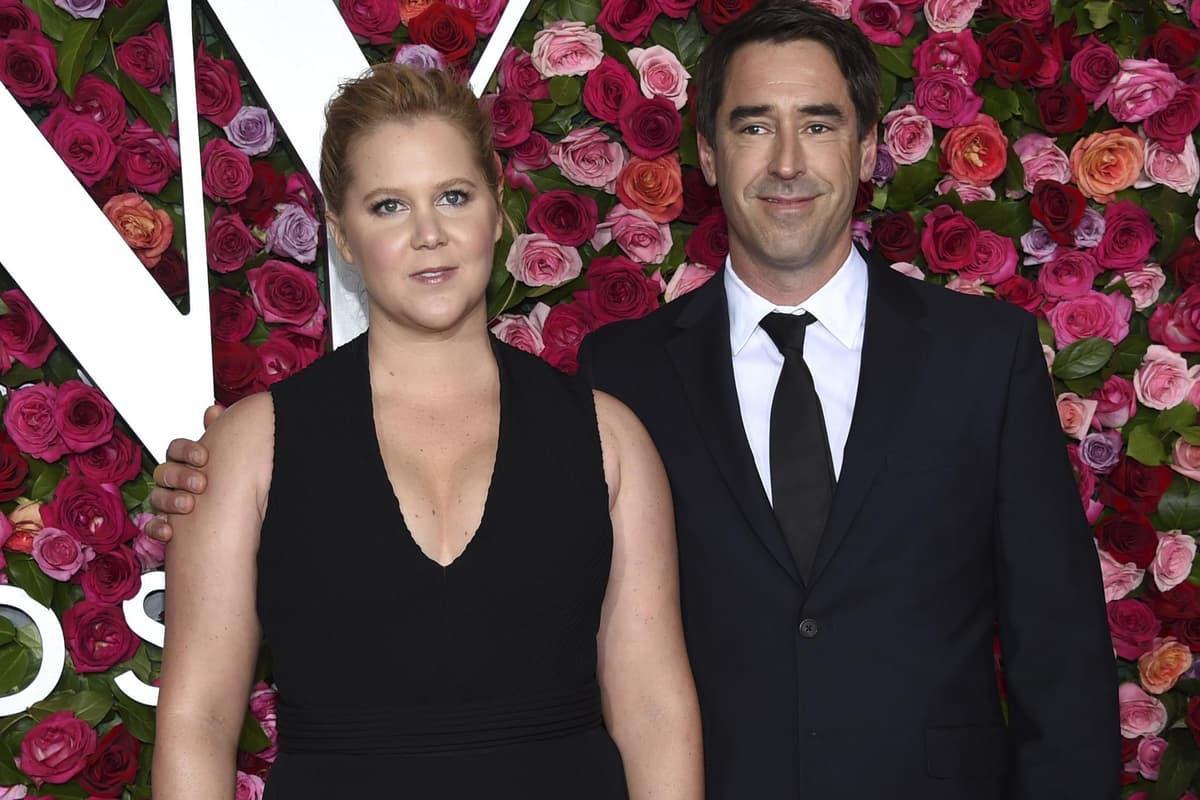 Amy Schumer and Chris Fischer together in a photo circulated with news of their split.