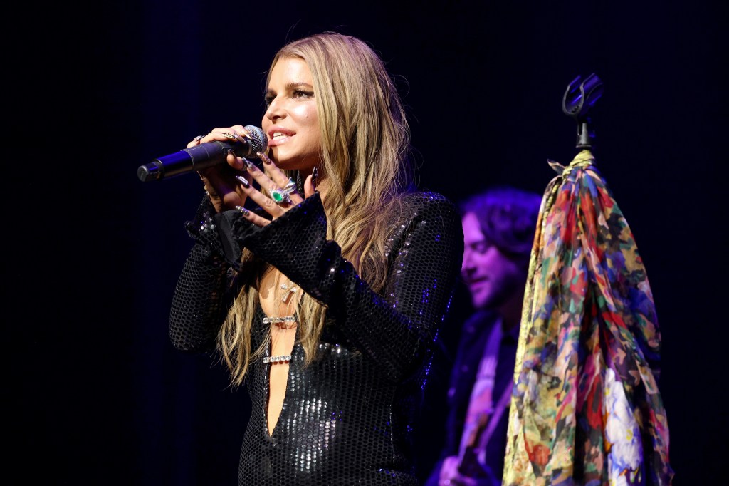 Jessica Simpson performs at Foxwoods Resort Casino in Connecticut, where she told the crowd she 'never felt good enough' in her early pop career.