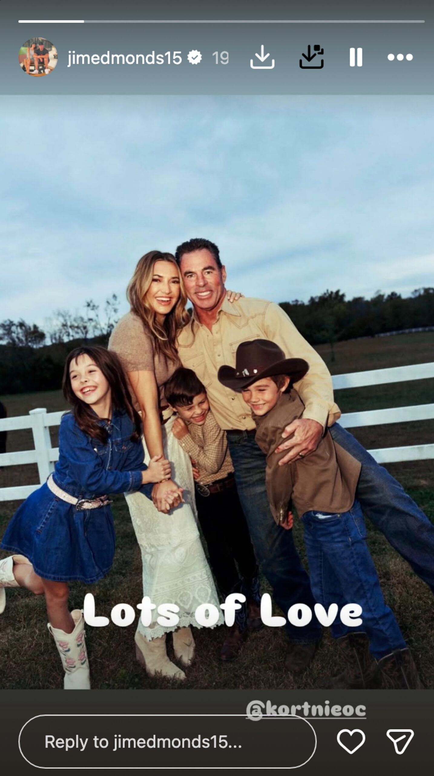 Jim Edmonds with wife Kortnie and his children in an outdoor family photo.