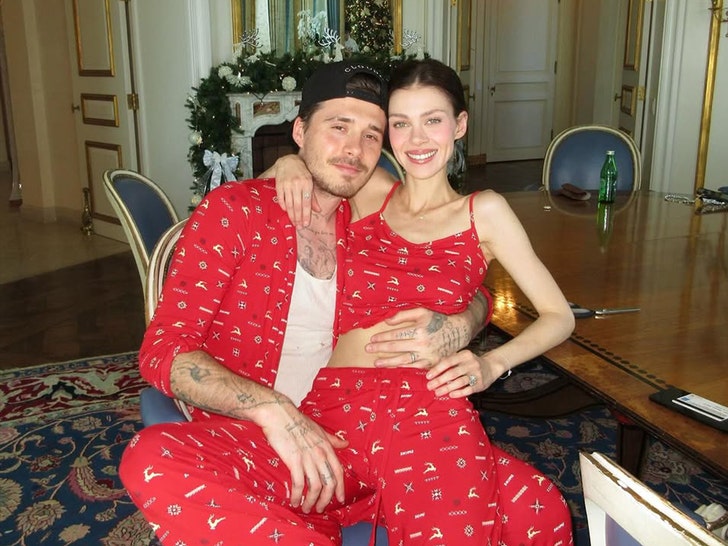 Brooklyn and Nicola Peltz Beckham in matching Christmas pajamas with Nelson and Claudia Peltz