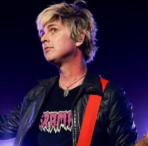 Billie Joe Armstrong of Green Day performing; the band will open Super Bowl 60