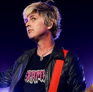 Billie Joe Armstrong of Green Day performing; the band will open Super Bowl 60