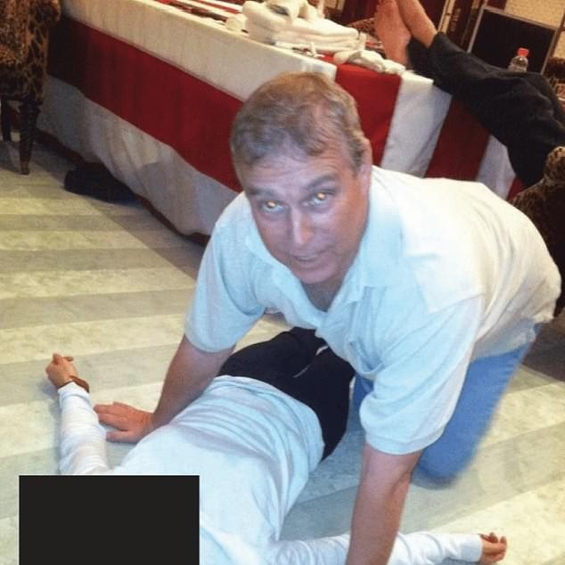 Disturbing new images released as part of last night's Epstein files appear to show Andrew Mountbatten Windsor crouching on all fours over a female lying on the floor - DailyMailUS