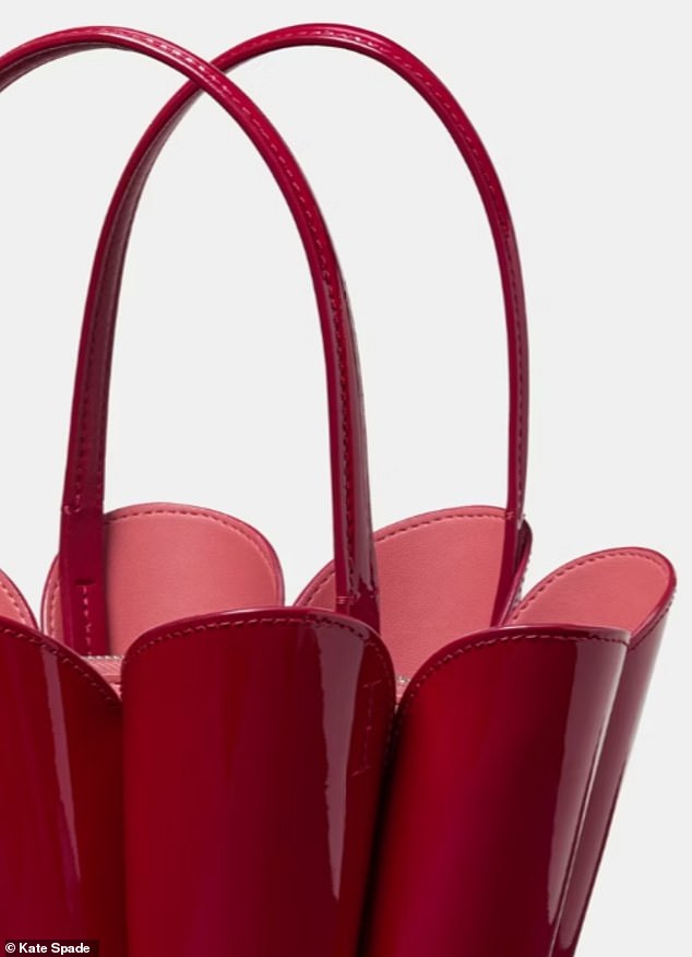 Kate Spade Patent Spade Flower Bucket Bag in red, side view highlighting the petal-shaped exterior.