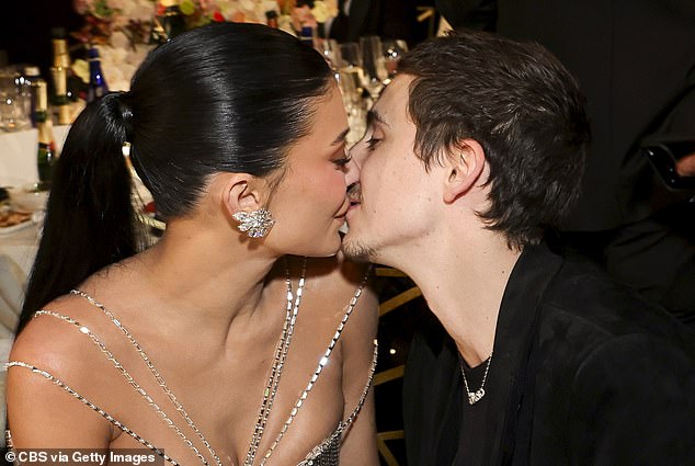 Timothee Chalamet thanks his parents and his partner, adding "I love you so much," after a celebratory kiss with Kylie Jenner