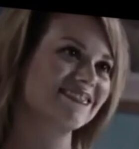 Hilarie Burton as Peyton Sawyer in a One Tree Hill still posted to Instagram Stories with the text 'IYKYK' and a vomiting emoji overlaid.