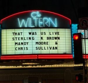 The Wiltern marquee advertising a live podcast with Sterling K. Brown, Mandy Moore and Chris Sullivan in Los Angeles.