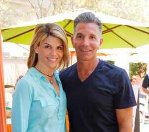 Lori Loughlin and Mossimo Giannulli posing together at the 6th Annual Kidstock Music And Arts Festival.