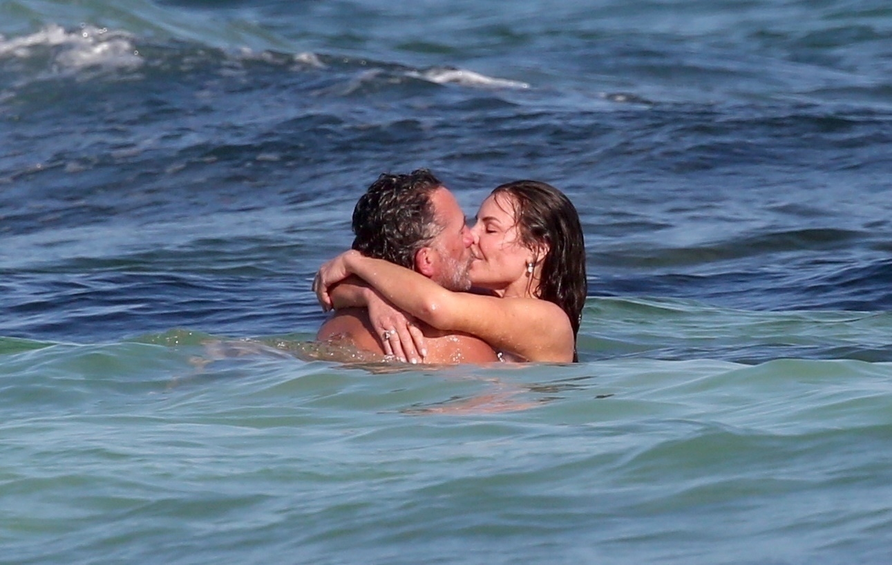 Luann De Lesseps and Michael Riemerschmid kissing in the Caribbean Sea.