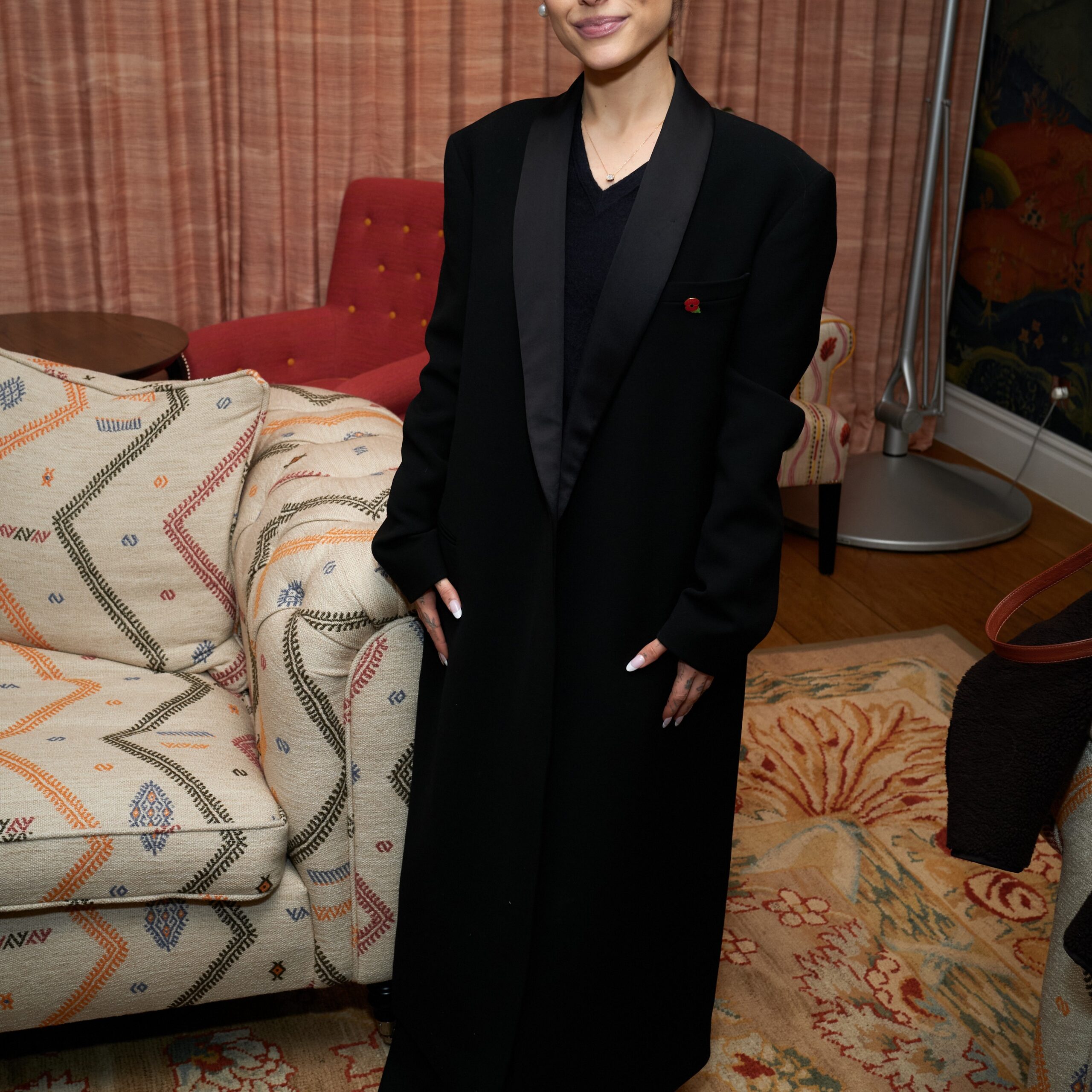 In the photo, the "Wicked" star - seen here in a Nov. 2025 photo - wore a retro floral Dior mini skirt and top. - pagesix