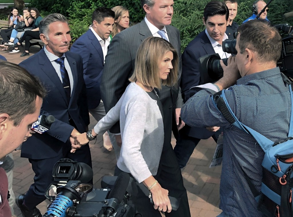 Lori Loughlin and Mossimo Giannulli leaving federal court.