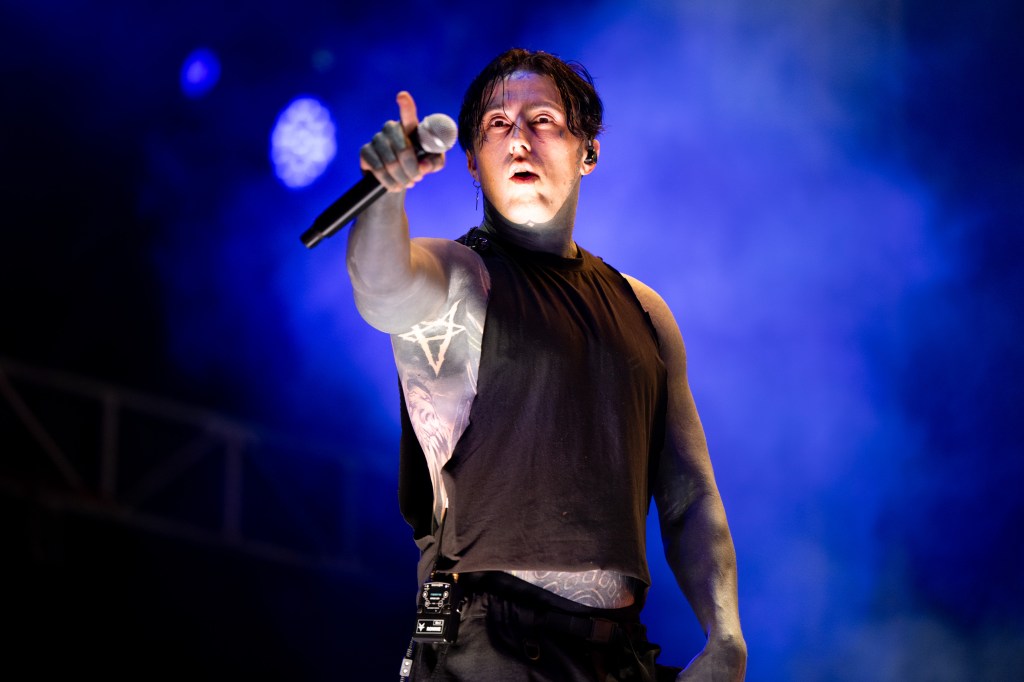 Ronnie Radke of Falling in Reverse performing onstage.