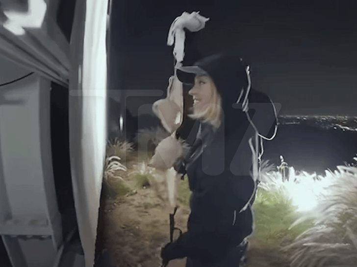 Bras from Sydney Sweeney's Syrn lingerie line draped across letters of the Hollywood Sign during the stunt.