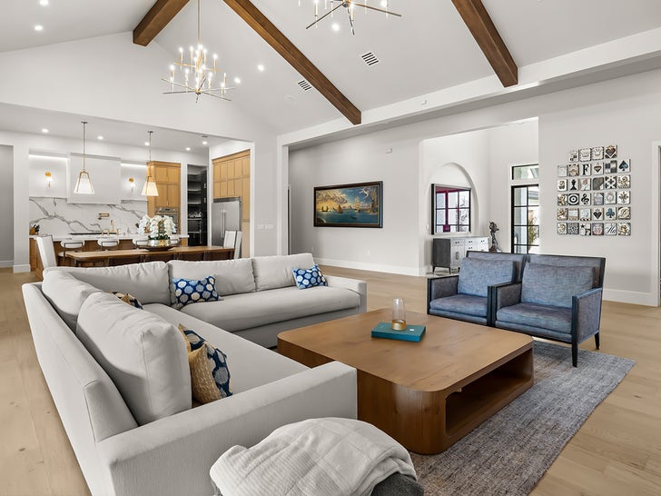 Open-plan interior with vaulted ceilings and wood beams inside Jeff Faine's Gotha home.