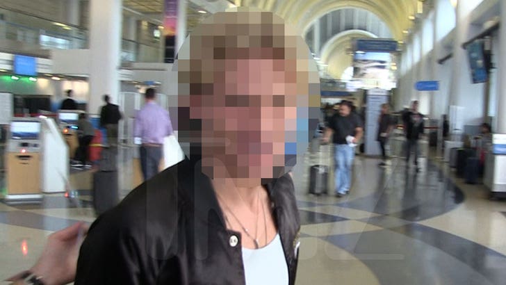 Cody Simpson at LAX in a 'Guess who?' airport clip, smiling as he fields a cheeky question about a controversial Sydney house. Photo: TMZ.com