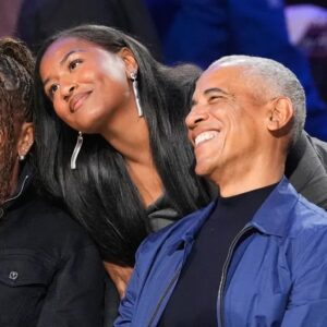 Sasha Obama joined her parents Barack and Michelle at the NBA All-Star game on Sunday. - AP