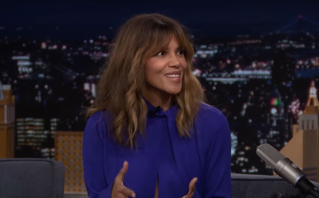 Halle Berry on The Tonight Show Starring Jimmy Fallon, smiling and speaking into a microphone.